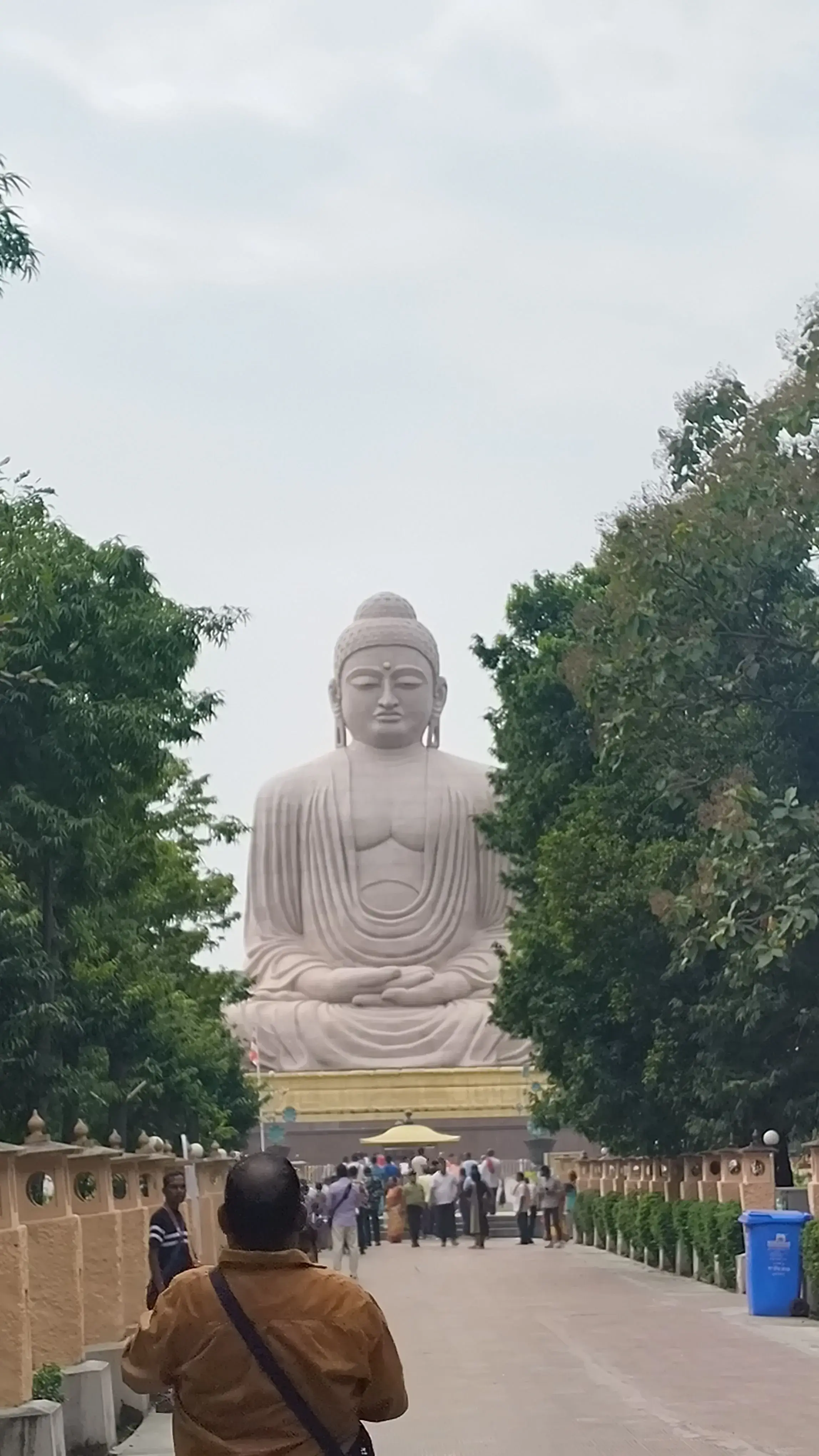 The iconic Great Buddha Statue at Bodh Gaya surrounded by gardens